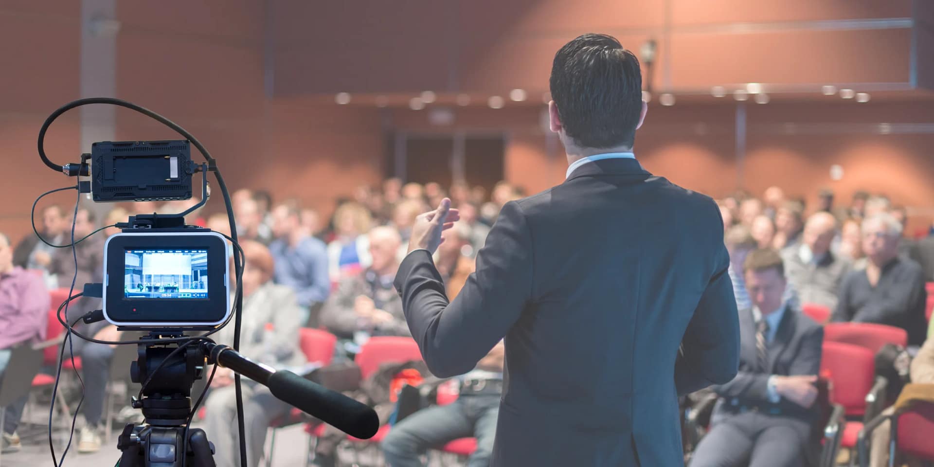 Image is related to Live Stream Service Showing Camera and Audience